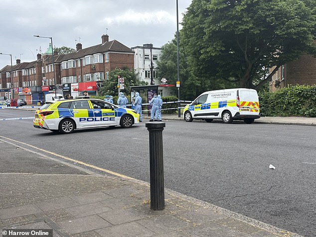 Pictures show a police and a forensics team at the scene which has been cordoned off with tape