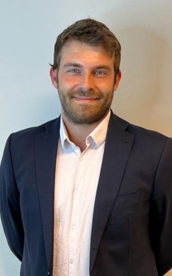 Portrait of a man in a suit.