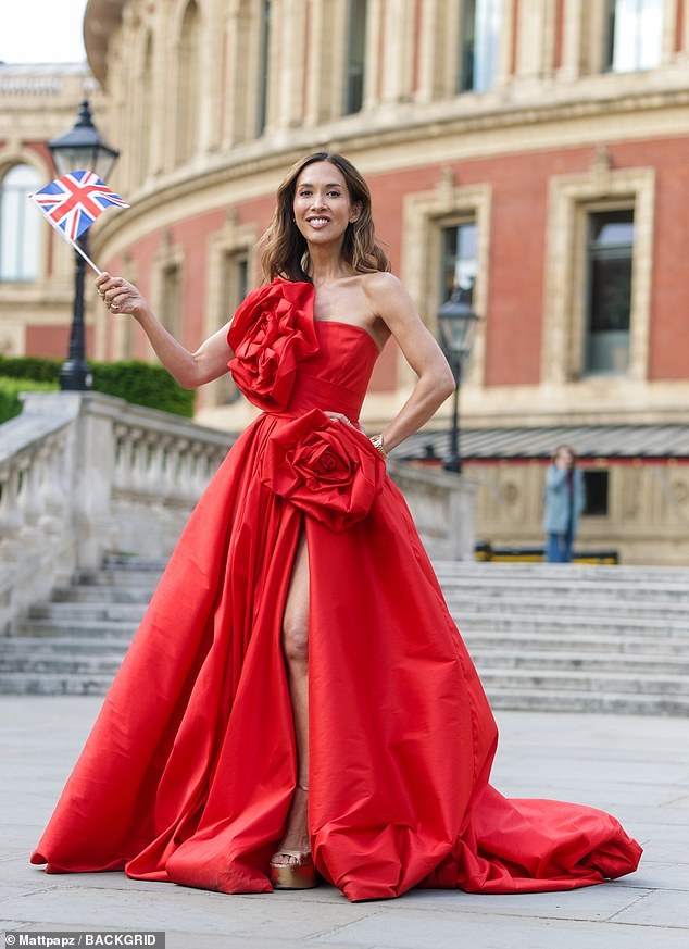 Myleene Klass, 47, exuded glamour in an elegant red gown as she led the stars celebrating the 80th anniversary of VE Day on Thursday