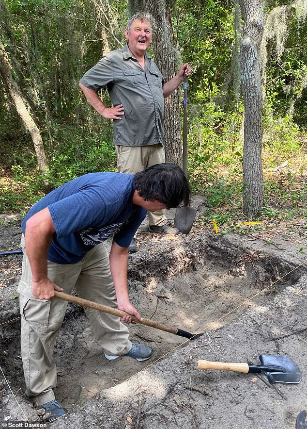 Archaeologists Mark Horton (behind) and Scott Dawson (in front) say they can now confirm what happened to the 'lost' colonists