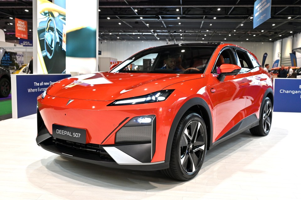 Red Changan Deepal S07 electric SUV on display.