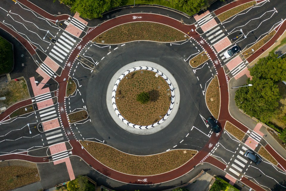 Aerial view of a cycle-friendly roundabout in Cambridge, England.