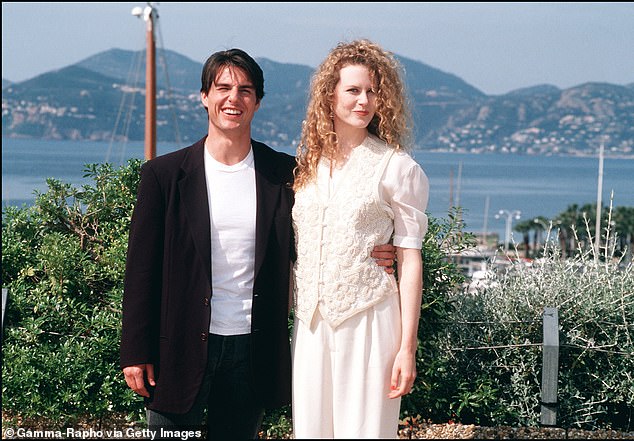 Even as her career soared with roles in Practical Magic, Batman Forever, and Australia, she largely stuck to variations of her signature look ¿ long, ginger-tinted waves with plenty of bounce; (seen with Cruise in 1992)