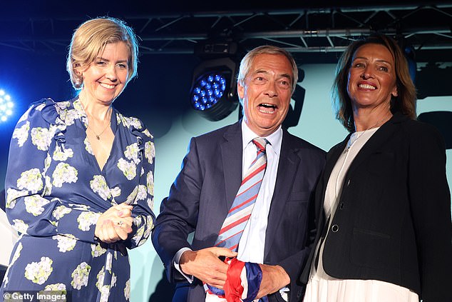 Nigel Farage was joined on stage by Dame Andrea Jenkyns winner of Greater Lincolnshire mayoralty (L), and Sarah Pochin winner of the Runcorn and Helsby by-election (R)