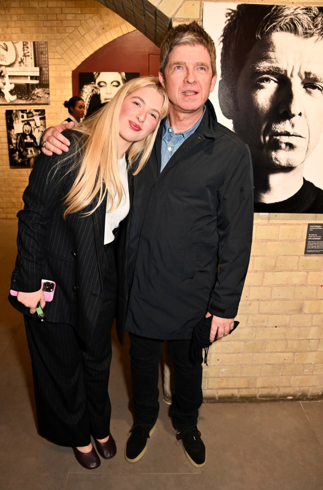 Anais and Noel Gallagher at a photography exhibition.
