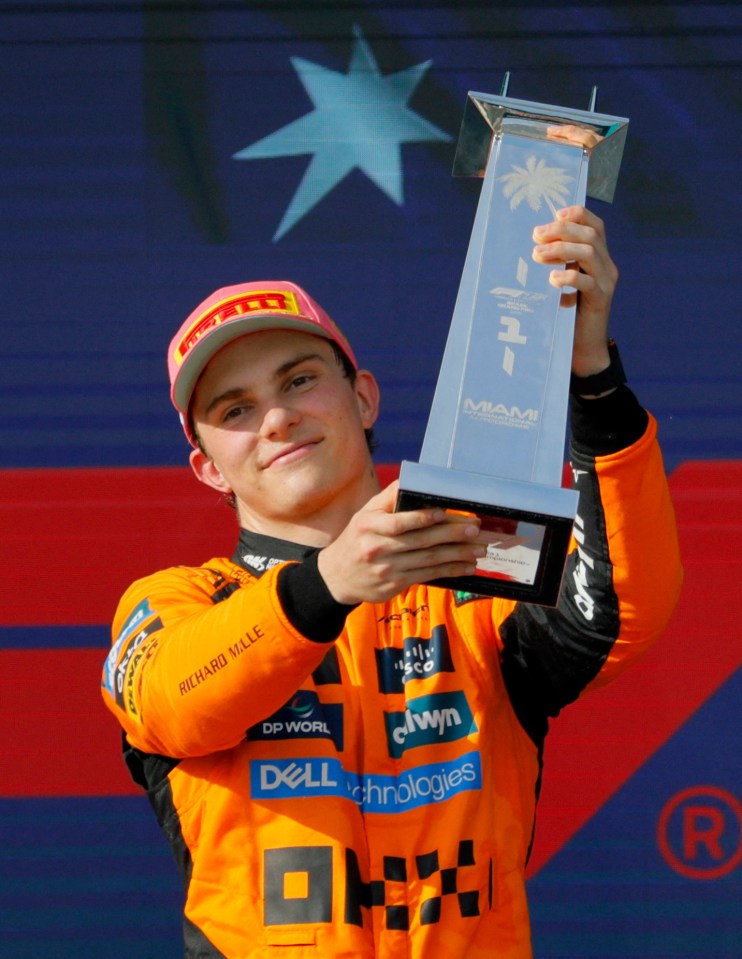 Oscar Piastri holding the Miami Grand Prix trophy.