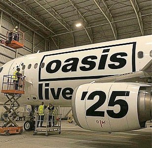 Fans will be thrilled to see a photograph, believed to have been taken inside a hangar at Luton Airport, showed staff putting the ‘Oasis live ’25’ branding on to the livery of an aircraft
