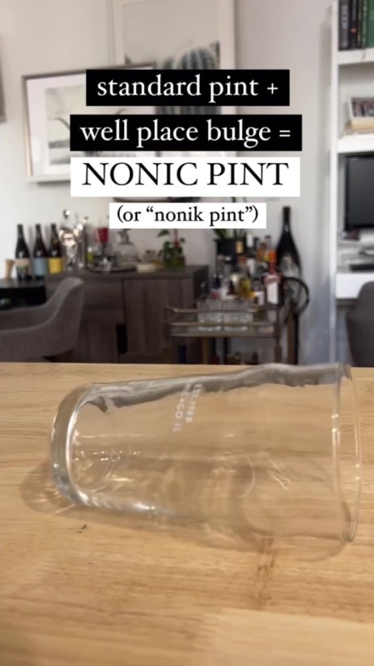 Empty pint glass with a noticeable bulge.