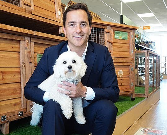 Mr Richmond, (pictured) who is known for enjoying a flamboyant lifestyle, runs the UK's second largest chain of pet shops, with an annual turnover of close to £100 million