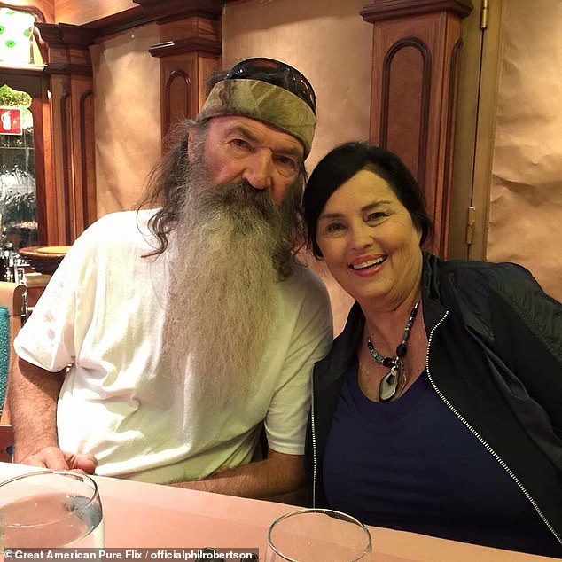 Duck Dynasty star Phil Robertson has died at the age of 79, his daughter-in-law Korie Robertson said Sunday on Facebook. Pictured with wife Kay, 77