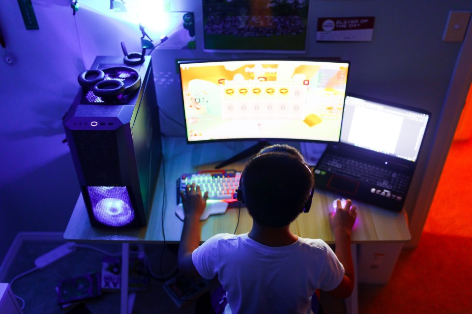 School boy using artificial intelligence on computer for learning purpose or for solving some education work problems.