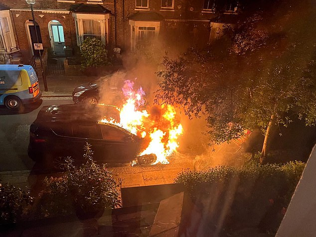 Police have arrested a second man in connection with three arson attacks targeting the Prime Minister. Pictured: A car set alight on 8 May