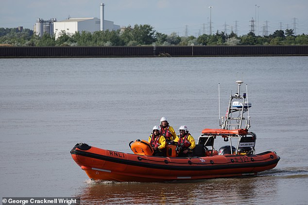 The boy has been recovered from the water and has been taken to hospital for further medical attention