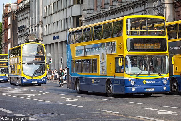 Police in Ireland were reportedly sent to stop a bus after a passenger refused to put away a packet of cheese and onion crisps (Pictured: Row of Dublin buses in a city centre street in Dublin, Ireland)