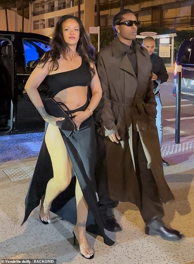 As Rihanna expects her third child she stepped out in yet another daring look while out and about in Cannes with her partner A$AP Rocky during the film festival on Tuesday