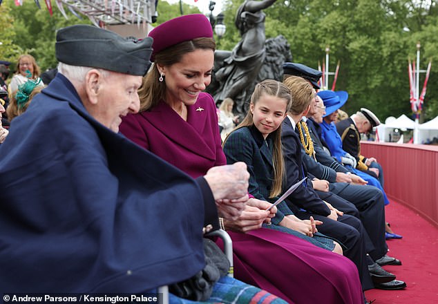 The Princess of Wales in conversation with Royal British Legion Veteran, Bernard Morgan, as he showed her some photographs