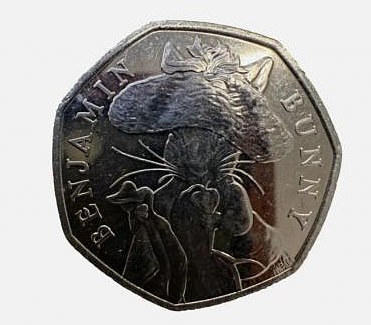 The coin features the mischievous fictional bunny, who can be seen wearing the 'Tam O' Shanter' hat borrowed from Mr. McGregor's scarecrow