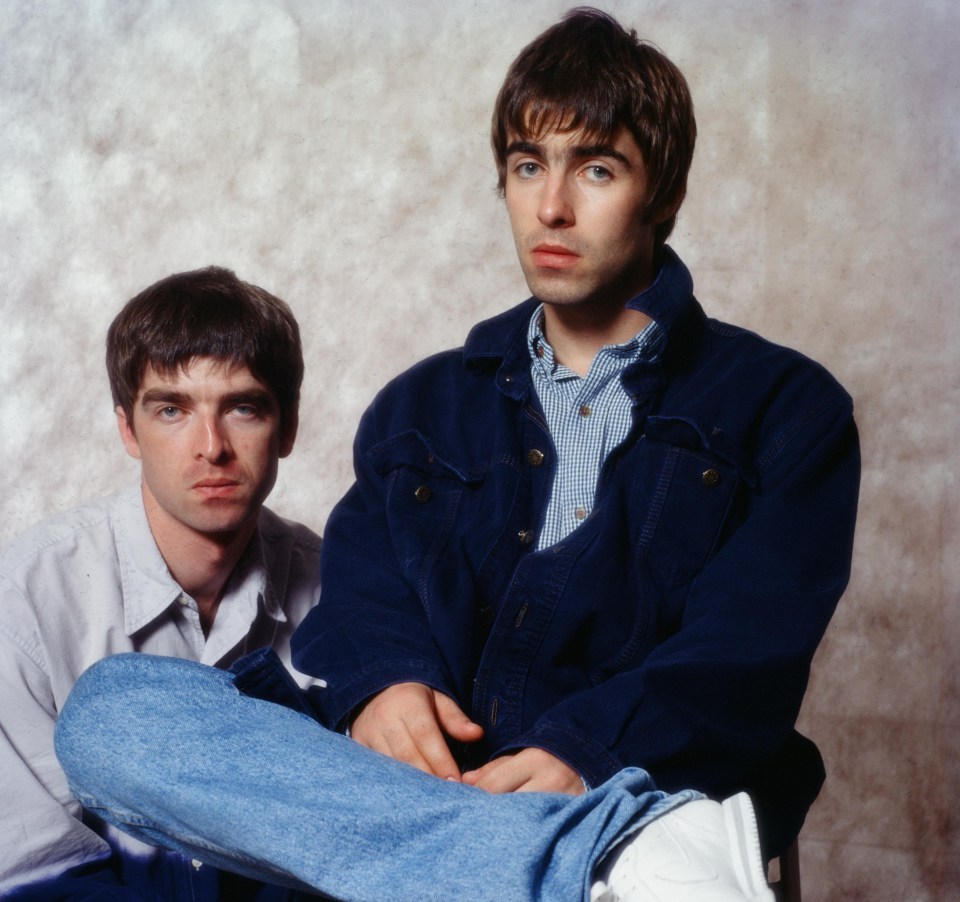 Photo of Noel and Liam Gallagher of Oasis at a photoshoot.