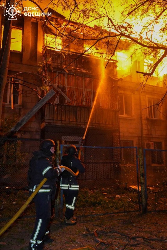 Firefighters battling a large building fire.
