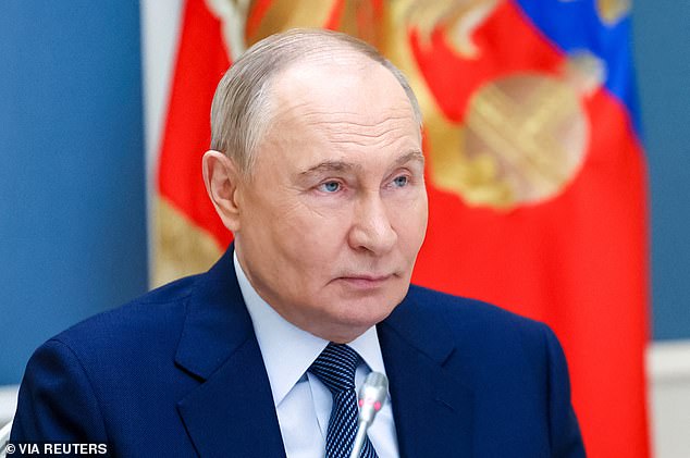 Vladimir Putin (pictured) will invade a NATO country if he succeeds in Ukraine, it has been warned