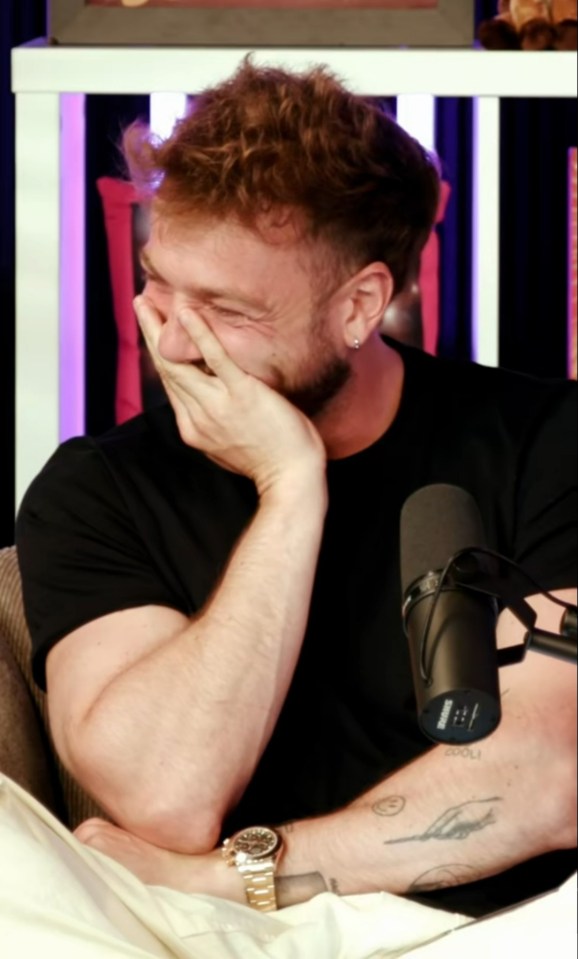 Sam Thompson laughing while on a podcast.