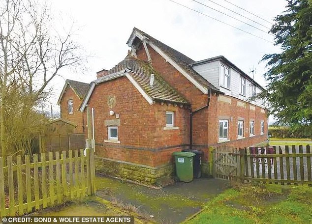 A former schoolhouse has been put on the market as two separate semi-detached houses