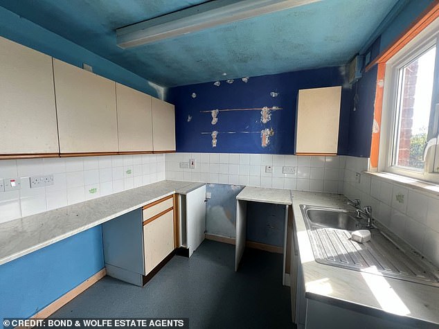 A partly gutted kitchen is also on show at these fixer-uppers