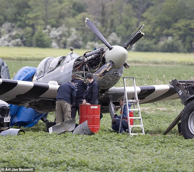 The Spitfire plane (pictured) made an emergency landing in among the crops of a farmers' field in West Hythe, Kent, on Saturday night