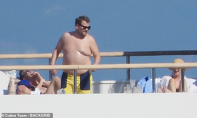Peeling off his shirt, Corden made the most of soaring coastal temperatures while unwinding on the chartered mega-yacht as it cruised the Mediterranean