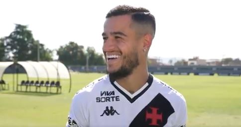 Coutinho smiling in soccer jersey.