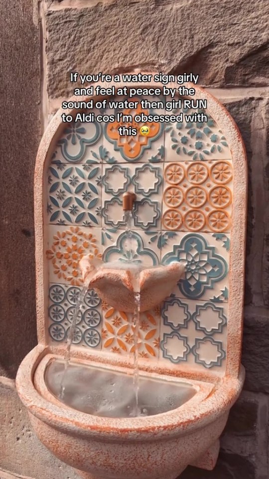 Water feature with patterned tiles, from Aldi.