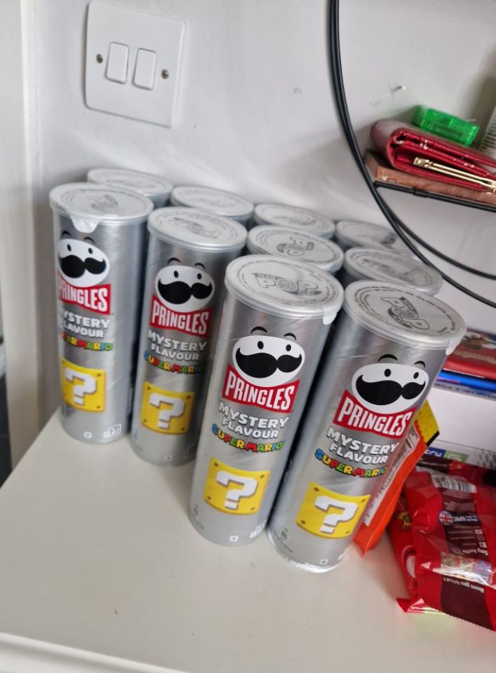 Several tubes of Pringles Super Mario Mystery Flavor chips.