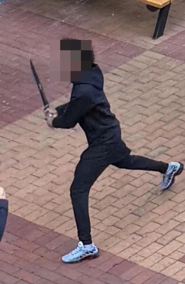Person wielding a knife in a Melbourne shopping center.