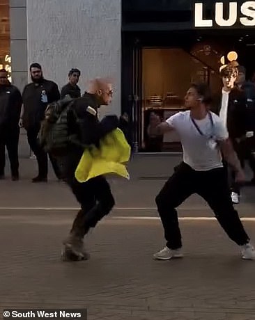 Horrifying footage has revealed a man was knocked unconscious by a sickening punch after violence erupted in a city centre