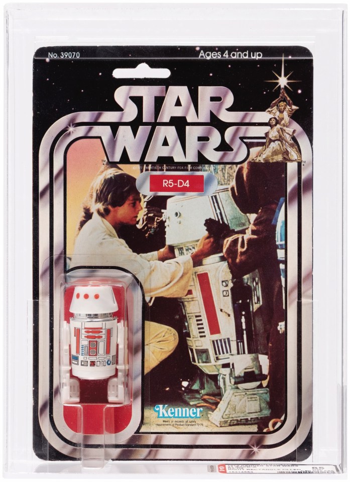 R5-D4 Star Wars action figure in original packaging.