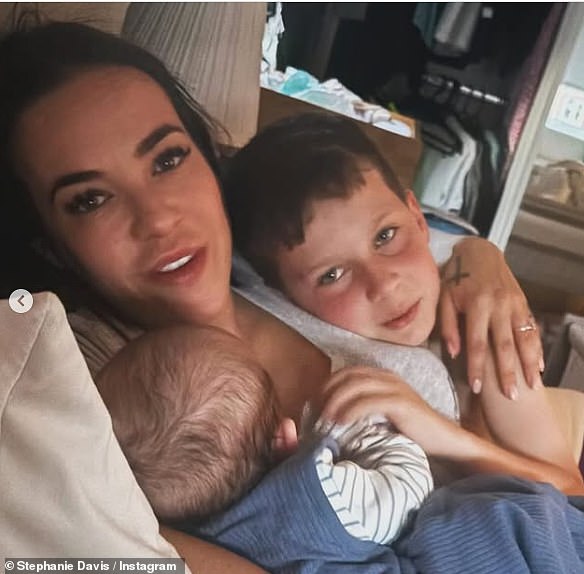 Stephanie Davis has revealed she has anxiety and dread-filled nights as her two-month-old son Samuel was rushed to hospital twice when he 'stopped breathing' (pictured with her older son Caben, 7)
