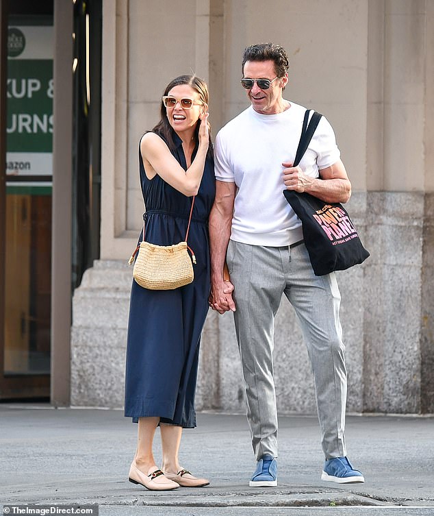 Hugh Jackman and his girlfriend Sutton Foster put on a loved-up display as they enjoyed a romantic walk in New York City on Saturday