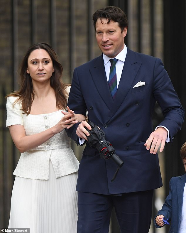 Newlyweds: Colonel Thompson with his now wife Olivia Lewis last year. They quietly married last Saturday at the quaint St Mary¿s Church in Great Bedwyn