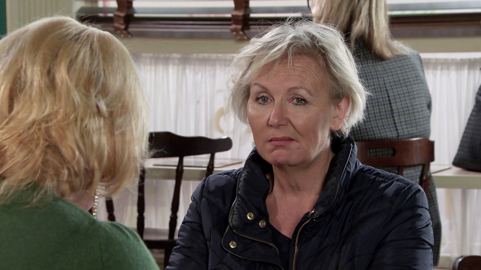 Eileen Grimshaw from Coronation Street talking to another woman.