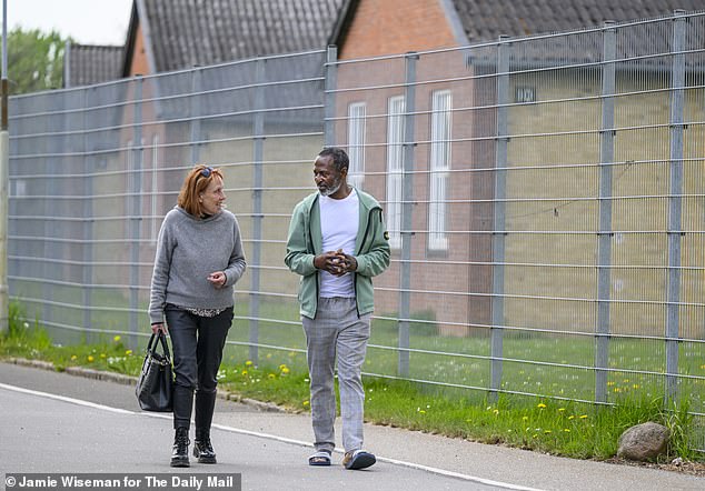 Cameroonian lawyer Ndam Carlson Agwo, 48 ,speaking to Sue Reid at the deportation centre