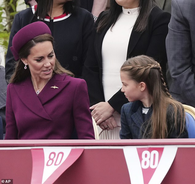 A professional lip reader has shared a sweet exchange between the Princess of Wales and Princess Charlotte, revealing that the mother-of-three say: 'Doesn't papa look smart today' to her daughter