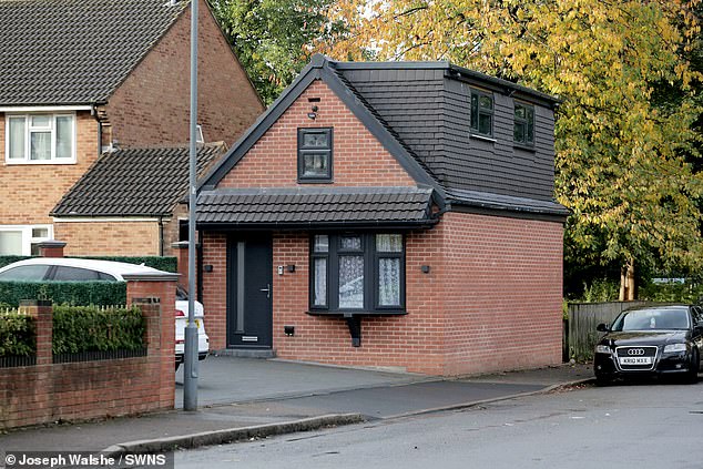 A tiny house was built on a driveway instead of a garage, leaving council bosses in Birmingham shocked. Pictured is what the two-story dwelling previously looked like