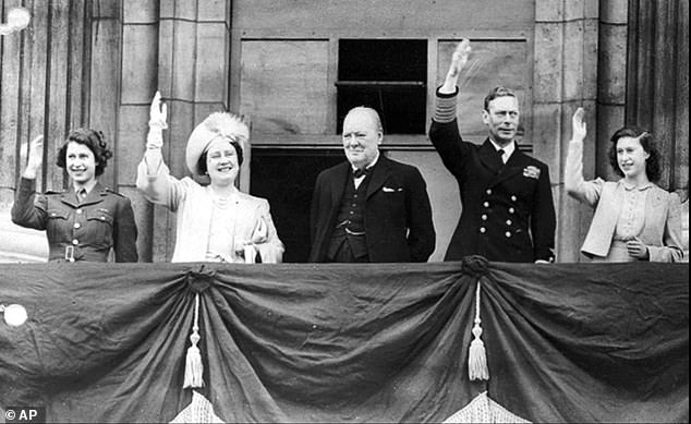 Britain's Prime Minister Winston Churchill, centre, joined the Royal Family - from left, Princess Elizabeth, Queen Elizabeth, King George VI and Princess Margaret - on the balcony of Buckingham Palace, London, England, on VE-Day
