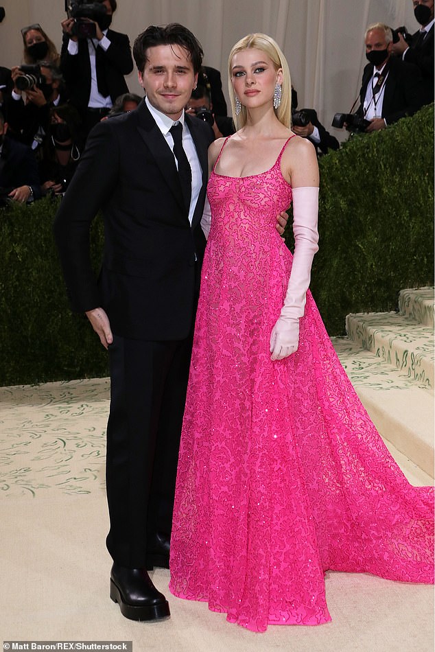It emerged on Wednesday that Brooklyn Beckham and his wife Nicola Peltz, pictured at the Met Gala in 2021, had rubbed shoulders with Prince Harry and Meghan at a dinner in Montecito