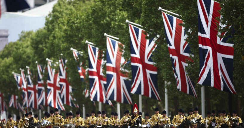 Members of the armed forces parade down The Mall during the V-E Day 80th anniversary parade in London, England, on Monday.