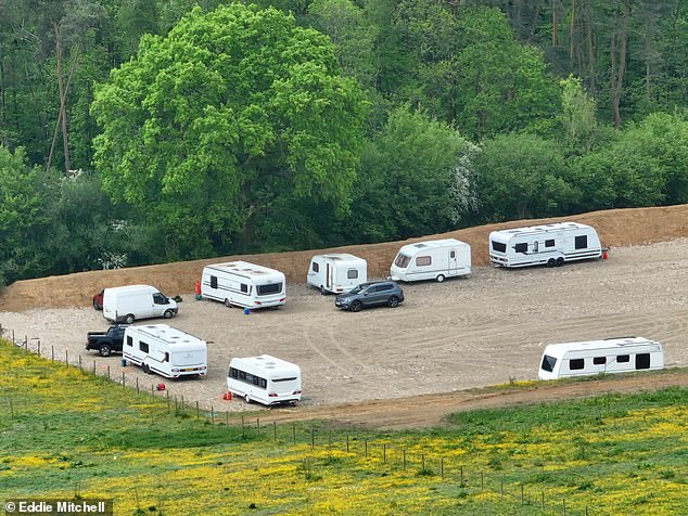 At least 10 vehicles, including seven caravans and motorhomes, have pitched up on what has become a building site at Blind Lane, near Petworth in West Sussex