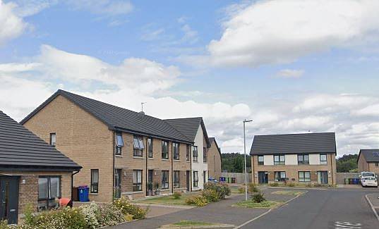 Margaret McGowan, has been named locally as the 71-year-old pronounced dead at her home on Newfield Square in Nitshill, Glasgow (pictured), at around 9.45pm on Saturday following 'disturbance'