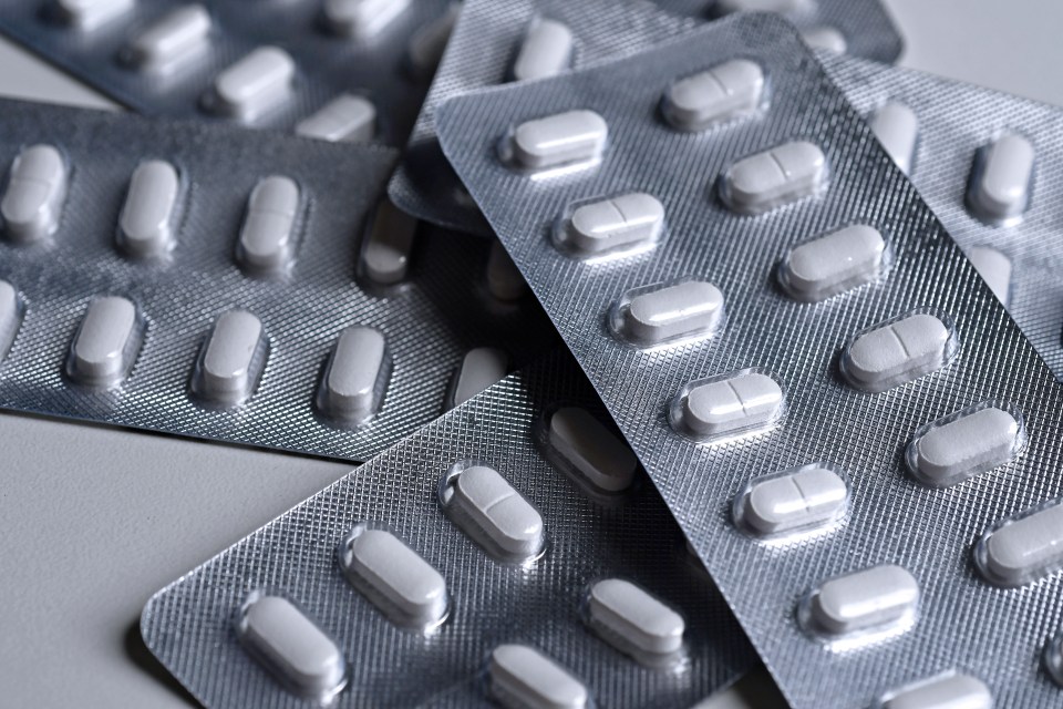 Close-up of several blister packs of pills.