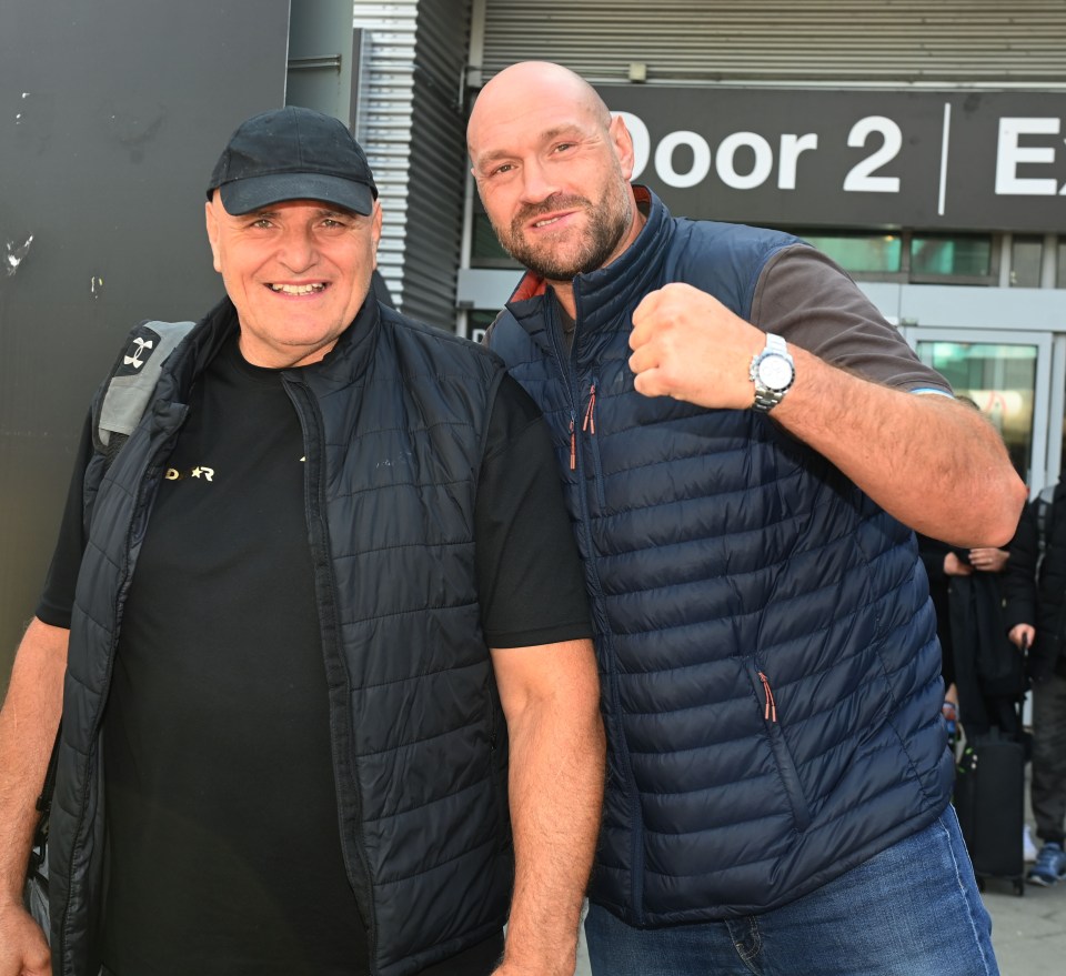 Tyson Fury and his father arriving in Manchester.