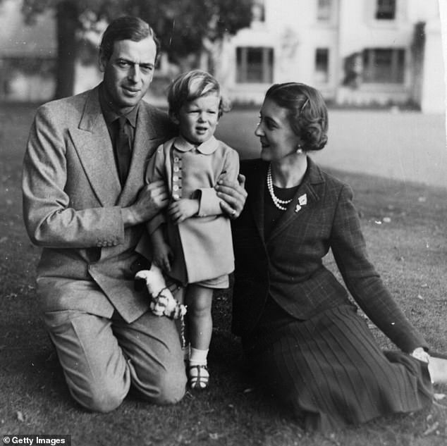 The late Duke of Kent with his wife and son, Prince Edward, the current Duke of Kent, in the garden of his country home Coppins in Iver, Buckinghamshire, in 1937